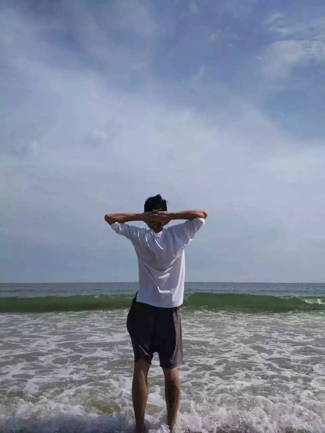 把我看海的照片还给我是什么歌