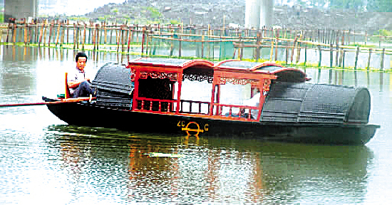 远远远去的乌篷船什么歌