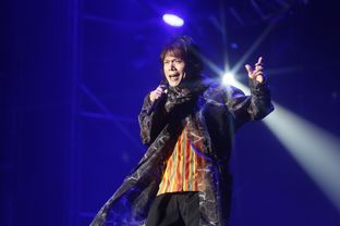 伍佰属于什么风格，伍佰算摇滚吗